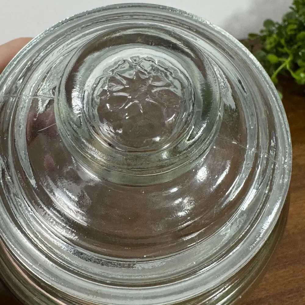 Clear Glass Apothecary Storage Jar with Lid Star Design on Lid 5